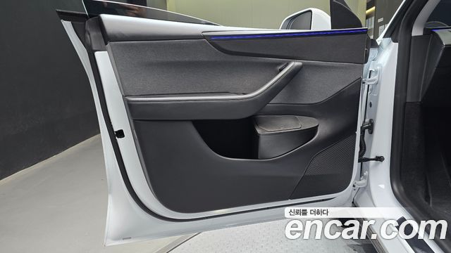 Tesla Model Y 2025 — photo 14