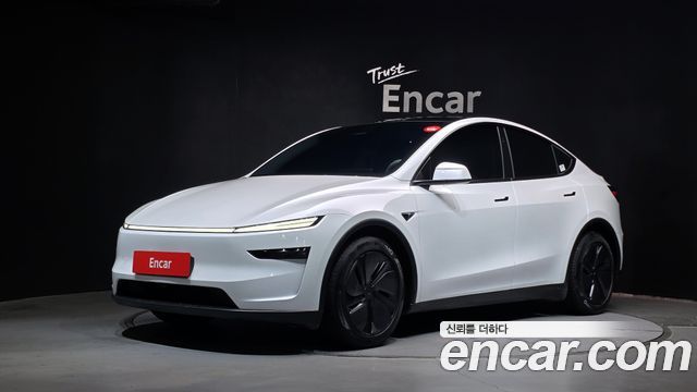 Tesla Model Y 2025 — photo 1