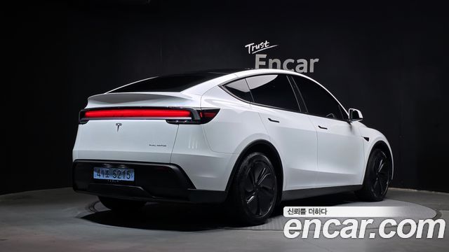 Tesla Model Y 2025 — photo 2