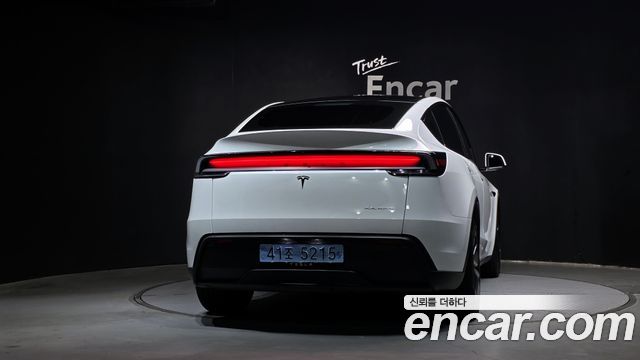 Tesla Model Y 2025 — photo 4