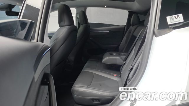 Tesla Model Y 2025 — photo 18