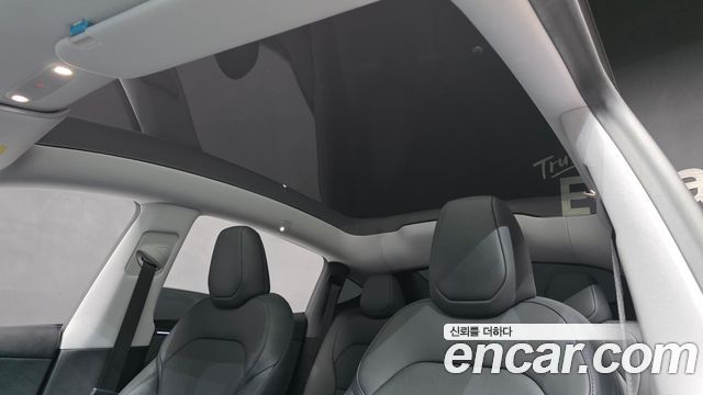 Tesla Model Y 2025 — photo 26
