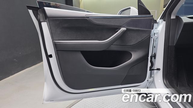 Tesla Model Y 2025 — photo 14