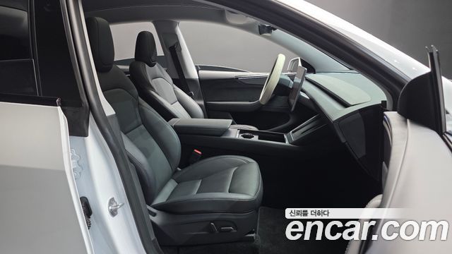 Tesla Model Y 2025 — photo 16