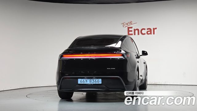 Tesla Model Y 2025 — photo 4