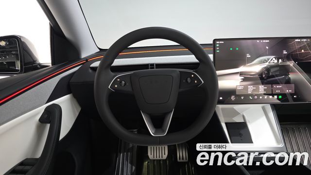 Tesla Model Y 2025 — photo 19