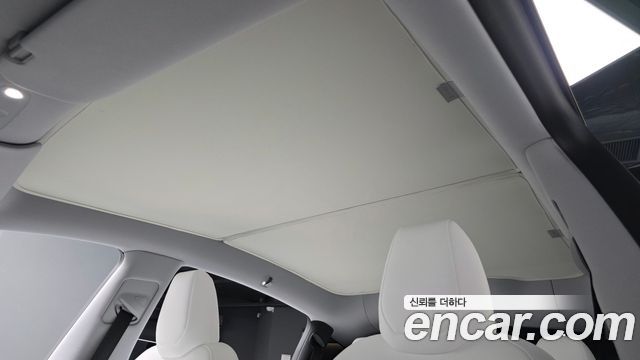 Tesla Model Y 2025 — photo 22