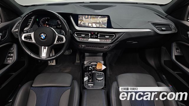 BMW 1-Series 2023 — photo 10