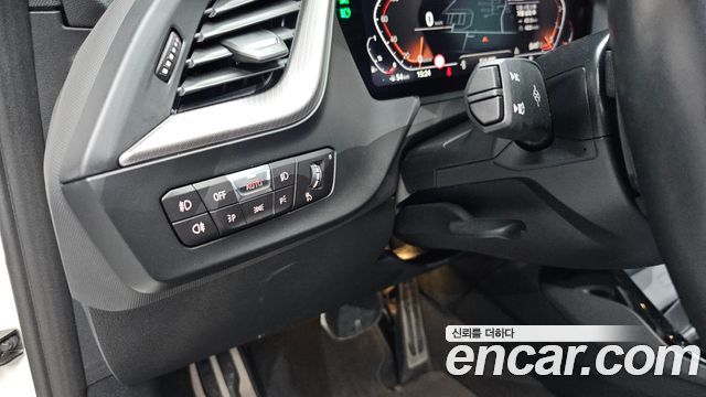 BMW 1-Series 2023 — photo 20