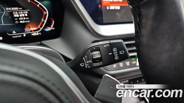 BMW 1-Series 2023 — photo 22