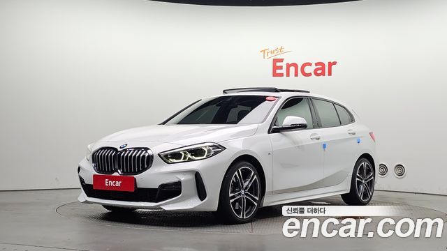 BMW 1-Series 2023 — photo 1
