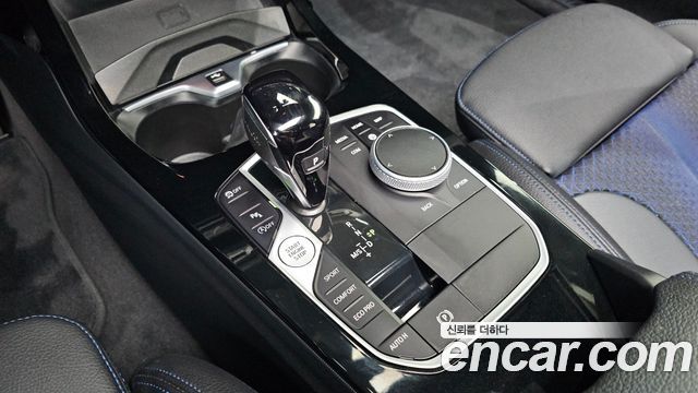 BMW 1-Series 2023 — photo 12
