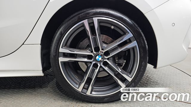 BMW 1-Series 2023 — photo 7