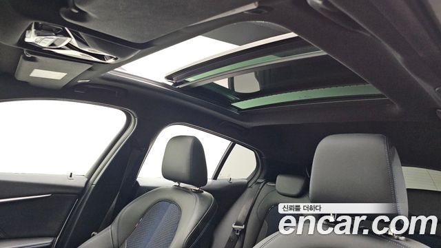 BMW 1-Series 2023 — photo 28