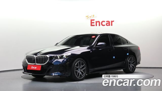 BMW 5-Series 2024 — photo 1