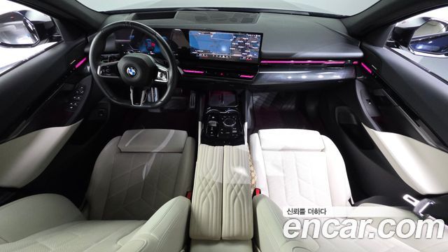 BMW 5-Series 2024 — photo 10