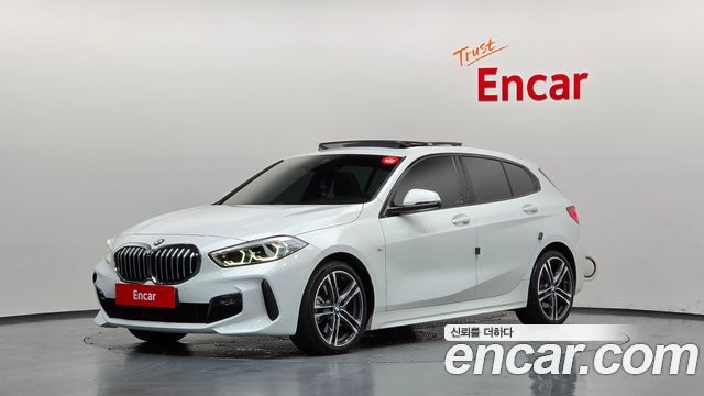 BMW 1-Series 2024 — photo 1