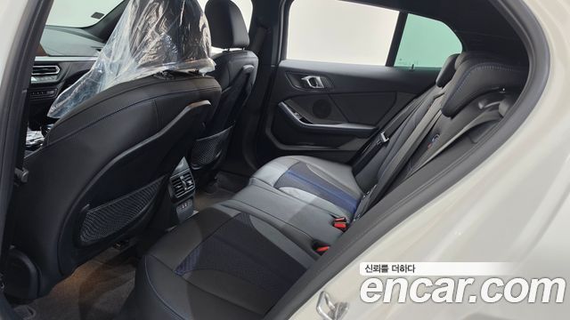 BMW 1-Series 2024 — photo 17