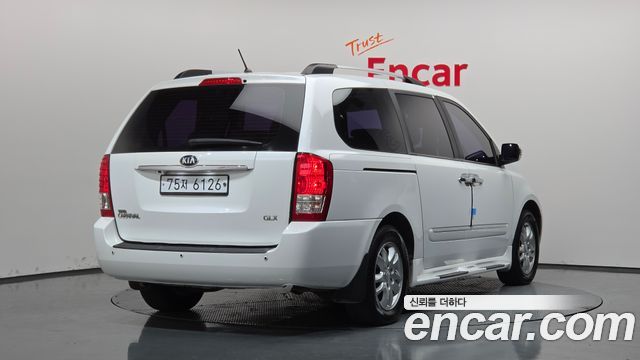 Kia Canival 2013 — photo 2
