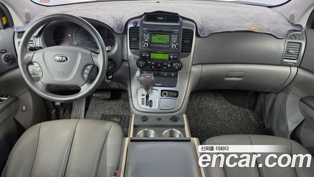Kia Canival 2013 — photo 10