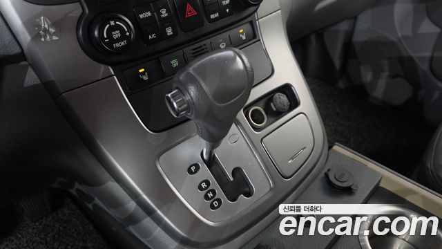 Kia Canival 2013 — photo 12