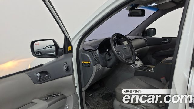 Kia Canival 2013 — photo 13