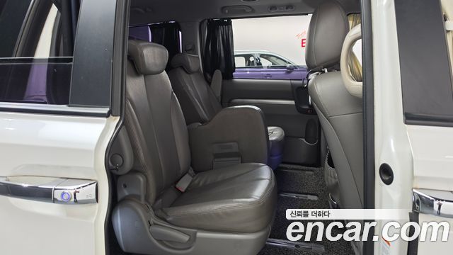 Kia Canival 2013 — photo 17
