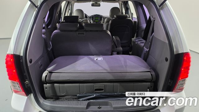 Kia Canival 2013 — photo 21