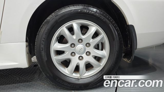 Kia Canival 2013 — photo 7