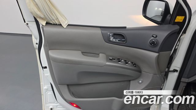 Kia Canival 2013 — photo 14