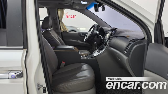 Kia Canival 2013 — photo 16