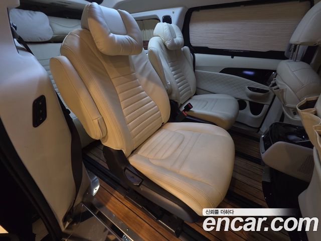 Kia Canival 2023 — photo 24