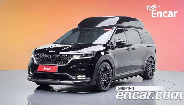 Kia Canival 2023 — photo 1