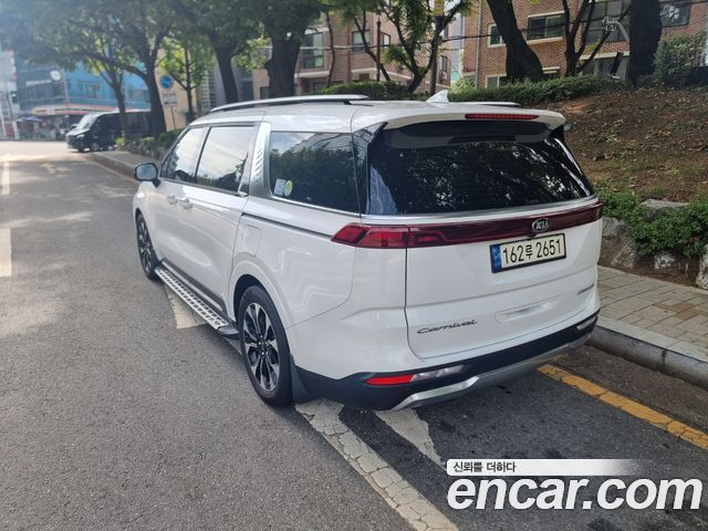 Kia Canival 2021 — photo 2