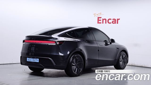 Tesla Model Y 2025 — photo 2