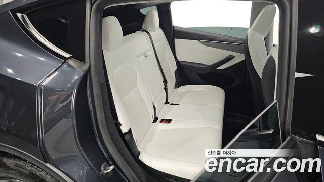 Tesla Model Y 2025 — photo 18