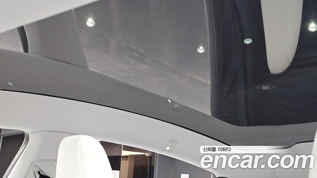 Tesla Model Y 2025 — photo 24