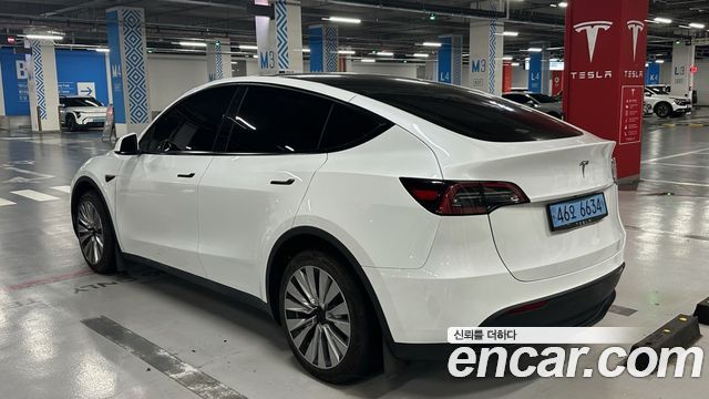 Tesla Model Y 2023 — photo 2