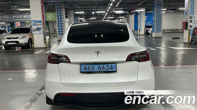 Tesla Model Y 2023 — photo 4