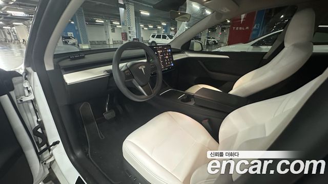 Tesla Model Y 2023 — photo 17