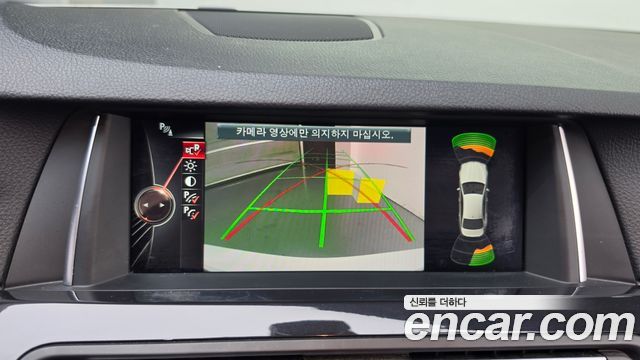 BMW 5-Series 2015 — photo 21