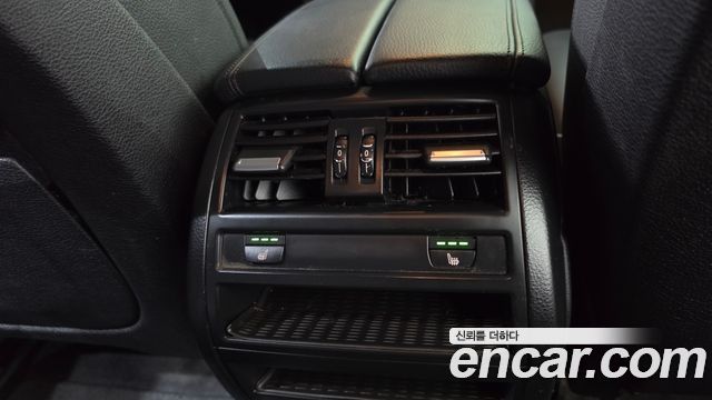 BMW 5-Series 2015 — photo 24