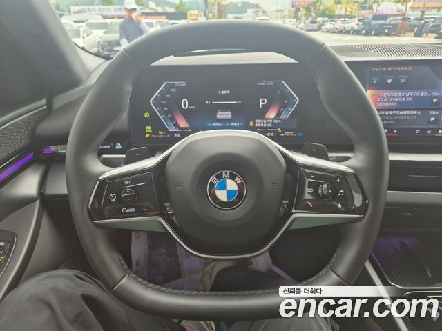 BMW 5-Series 2024 — photo 10