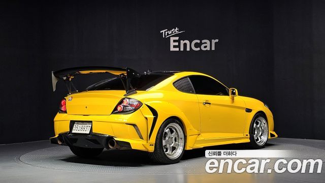 Hyundai Tuscani 2007 — photo 2