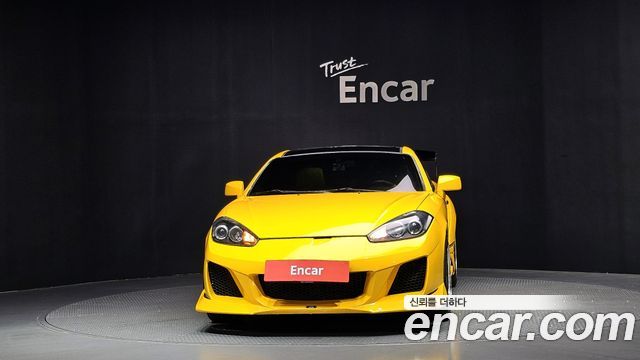 Hyundai Tuscani 2007 — photo 3