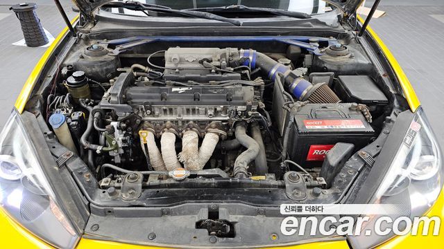 Hyundai Tuscani 2007 — photo 6