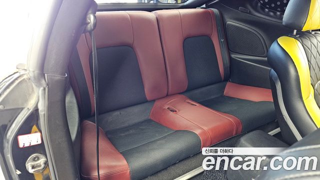 Hyundai Tuscani 2007 — photo 12
