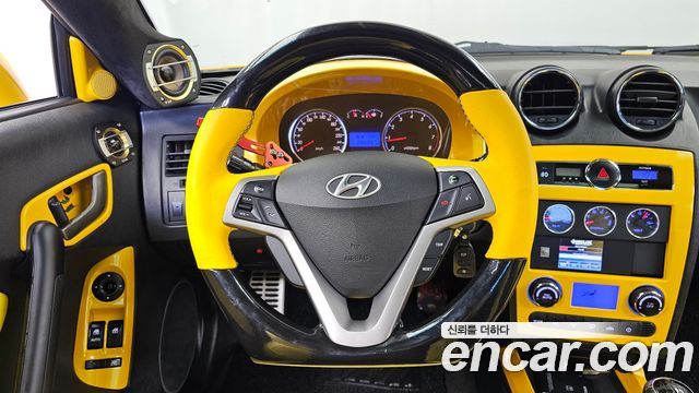 Hyundai Tuscani 2007 — photo 13