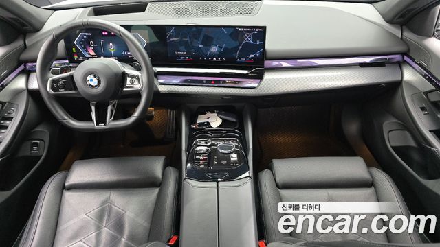 BMW 5-Series 2024 — photo 10