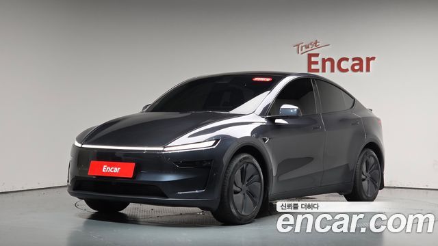 Tesla Model Y 2025 — photo 1